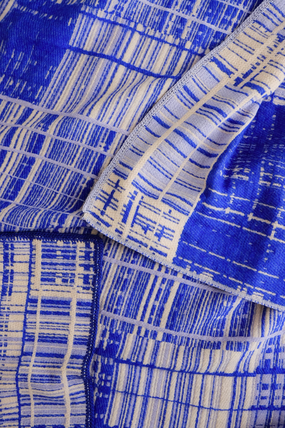 Detail of jacquard-woven textile pattern by Emma Terweduwe in blue tones