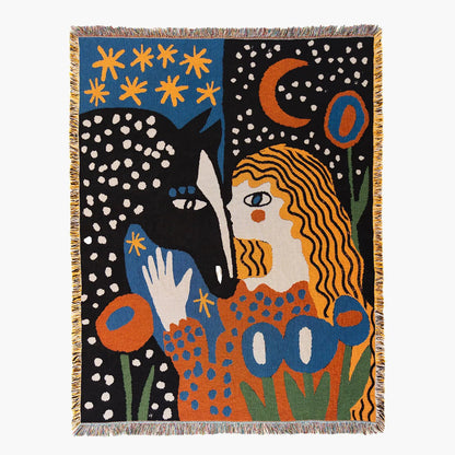 Alma woven blanket by Enikő Katalin Eged featuring abstract female figure and bold colors, presented as textile wall art
