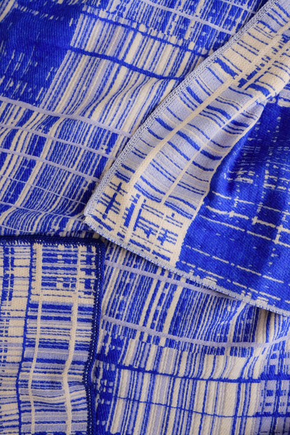 Detail of jacquard-woven textile pattern by Emma Terweduwe in blue tones
