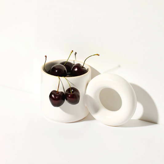 EAR mugs by Malwina Konopacka in assorted colours, featuring the sculptural round handle and handcrafted ceramic finish from the RUIMTE curated collection.