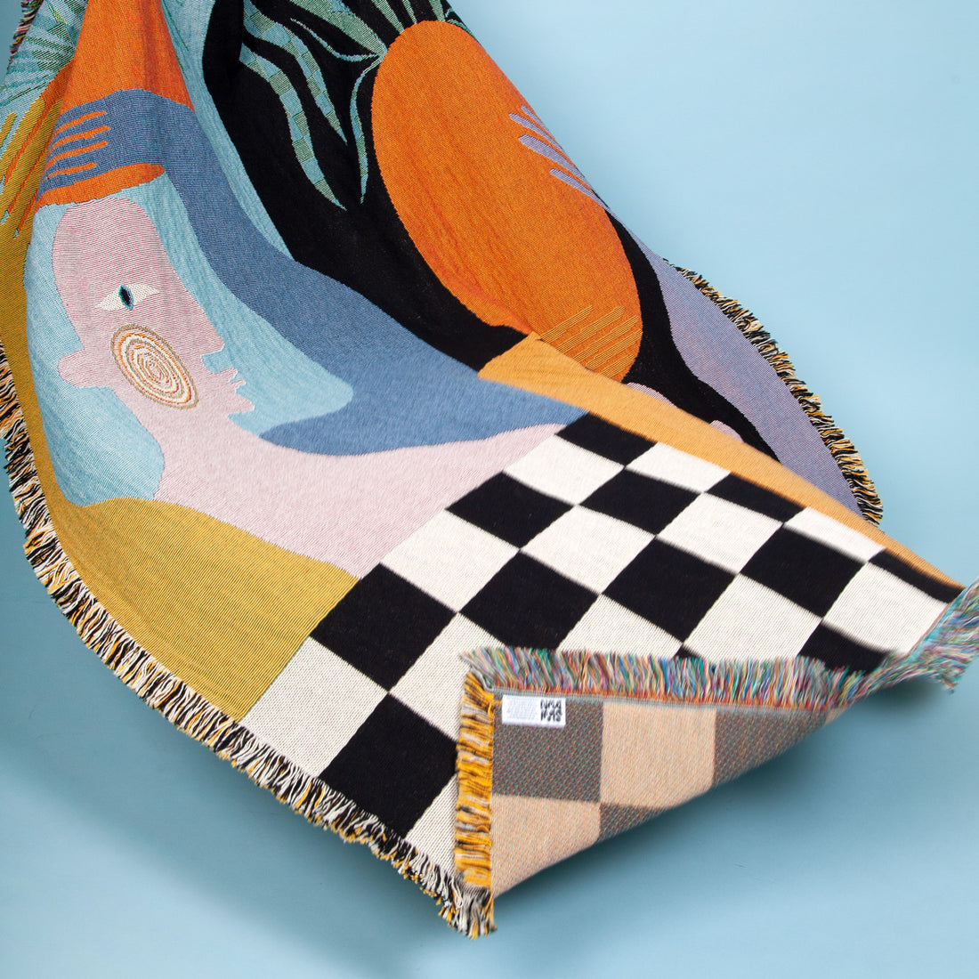 Detail of Moretti woven throw blanket by Imogen Sinclair showing woven texture and graphic pattern