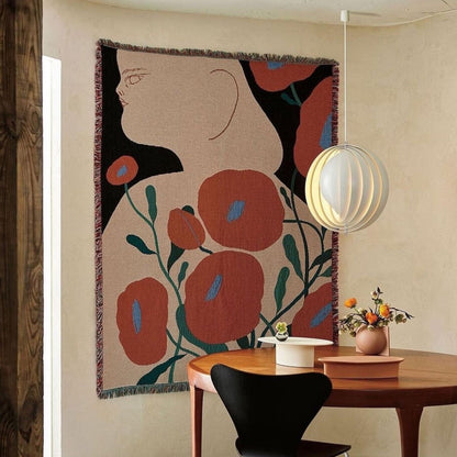 Melba woven throw blanket by Suvi Suitiala displayed on the wall as textile art in a modern interior