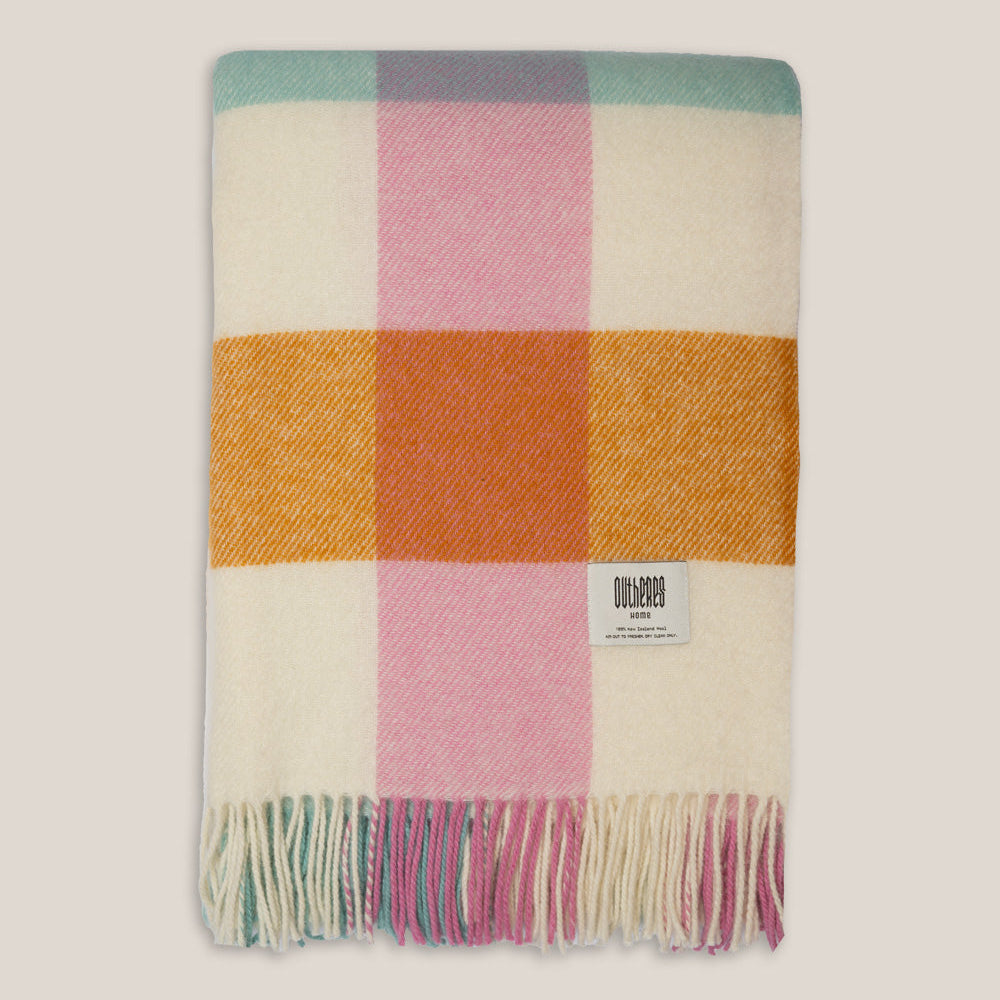 Close-up of a textured wool blanket showing the multicolor, from the RUIMTE collection.